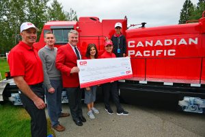 CP's VP of Corporate Affairs, Mark Wallace, presents $2 million cheque to the Alberta Children's Hospital Foundation, from left to right: Dr. Jim Kellner, Head, Dept. of Pediatrics, Alberta Health Services - Calgary Zone, Dr. Steven Greenway, Alberta Children's Hospital Pediatric Cardiologist, Saifa Koonar, President and CEO, Lorie Kane, LPGA Champion and CP Ambassador, and Alexa Castillo, CP Women's Open's Ambassador. (CNW Group/Canadian Pacific)